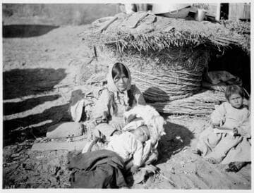 A Chemehuevi Madonna; cache for mesquite beans in the back