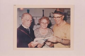 Dock Marston, Pearl Baker and Tom Busenbark at the introduction of sales of Pearl's book "Trail on the Water"