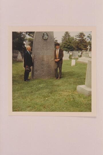 Dock Marston and Nate Marston at the grave of Powell.  Arlington Cemetery