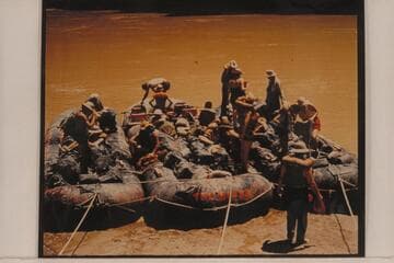 Georgie White's 3-boloney outfit.  Through the Grand Canyon; photo made as they were negotiating President Harding Rapid