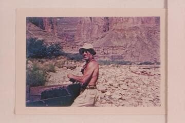 Dock Marston.  With the wreck of a skiff found in the drift pile.  At Nancoweap Creek--Marble Canyon.  First River trip for Marston