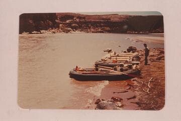 Lees Ferry, Colorado River.  Final photo on beach.  Equipment of the Cave Men used in run from Lees Ferry to Bright Angel Creek