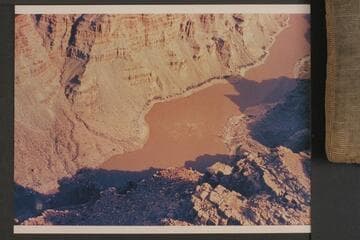 Mile 201 in Cataract Canyon.  Preliminary gauge:  29,700 cfs