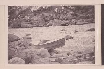 Buzz Holmstrom's boat being portaged at Vulcan Rapid