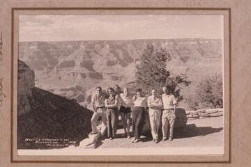 The 1938 Nevills party excepting Del Reed.  South Rim.  Signatures of the party on the frame and the presentation by Nevills to his parents