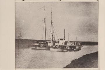 Schooner discharging cargo into what appears to be Barge No. 1 and the "Mohave I" at Port Isabel