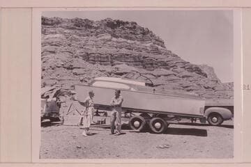 Margaret Marston and Jim Rigg before motor boat damaged on first run down canyon; Cliff Dweller's Lodge