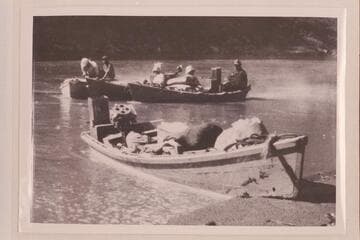 Skiffs with outboard motors used in LaRue party in Glen Canyon
