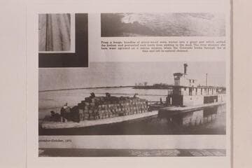 The "Searchlight" and barge aiding in closing the levee below Yuma