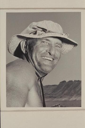 J. R. White ("Whitey").  Los Angeles.  At end of Grand Canyon traverse with Georgie White.  Temple Bar.  Lake Mead  [on photo reverse:  Mr. Georgie White!]