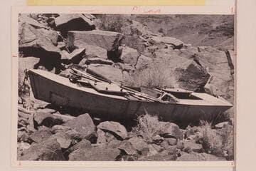 The "Ross Wheeler." built by Bert Loper for Charles Russell in 1914 and abandoned at Bass Cable in 1915.  She made the water traverse from Greenriver to Bass Cable with extended stops at Hite, Badger Creek Rapid, and below Pipe Creek