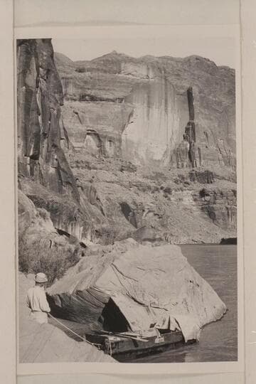 F. A. Thruman holding the "Moenkopi"; lower San Juan Canyon