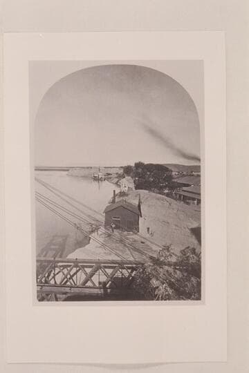 Southern Pacific rail bridge at Yuma.  The "GILA" is moored at the bank above the bridge