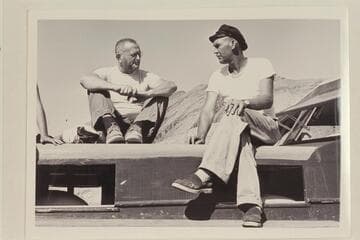 Taylor talks it over with Jimmy Jordan on Jordan's cruiser.  Gods Pocket, Lake Mead