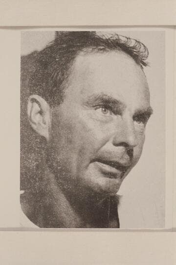 Norman Nevills on Lake Mead at end of 1947 Grand Canyon traverse.  Excessive strain is suggested in this unposed photo