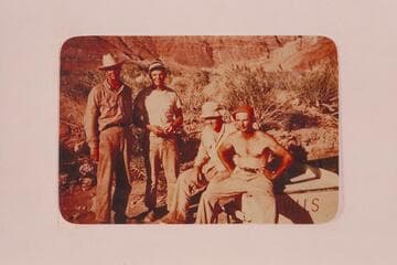 Boatmen of the Nevills San Juan party which left Mexican Hat in 1948, May 19.  Nevills wears the red hat, Ben Hess, George Wing and Frank Wright