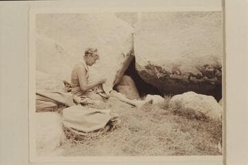 Margaret Marston catches up with the sewing.  Mouth of Supai Creek.  Mile 156, Grand Canyon.  [photo reverse:  Mending shoes and bathing suits.  MGM at Havasu Creek.  Colorado River]
