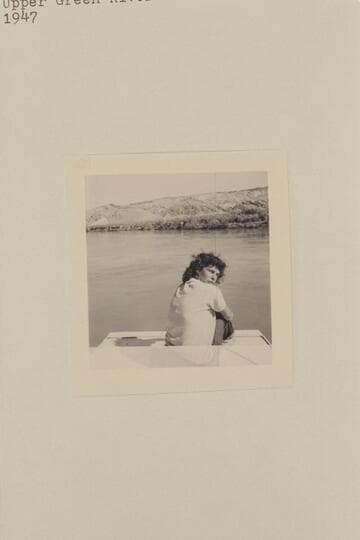 Maradel riding the stern of a Nevills sadiron.  Upper Green River